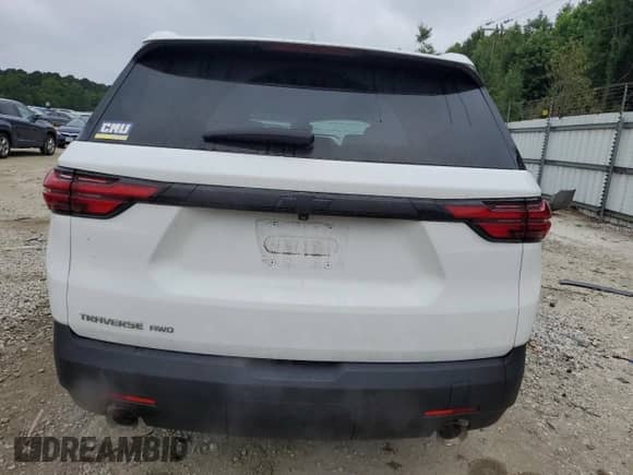 2023 Chevrolet Traverse LS with VIN 1GNEVFKW5PJ143078, listed as a Copart auction lot 60713665 with 56,117 mi miles and Salvage title. Bid and sale history available at DreamBid. Image 6.