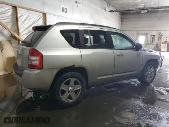 2010 Jeep Compass Latitude с VIN 1J4NF1FB8AD620344, выставлен на аукционе Copart как лот 88244265 с пробегом 169 861 миль миль и Чистый • Clean title. История ставок и продаж доступна на DreamBid. Изображение 3.