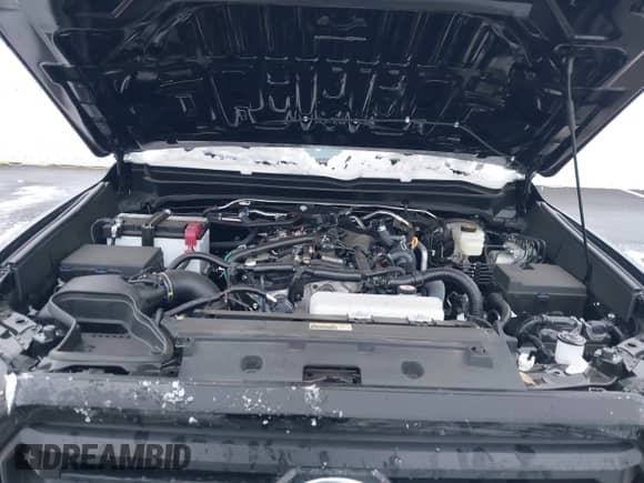 2024 Toyota Tacoma SR5 z VIN 3TMKB5FN3RM004833, wystawiony jako IAAI lot #41580572 z przebiegiem 7 039 mil mil oraz . Historia ofert i sprzedaży dostępna na DreamBid. Obrazek 10.