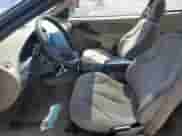 2002 Chevrolet Cavalier LS Sport z VIN 1G1JH12TX27127402, wystawiony jako Copart lot #57096165 z przebiegiem 217 999 mil mil oraz Szkoda całkowita • Salvage title. Historia ofert i sprzedaży dostępna na DreamBid. Obrazek 7.