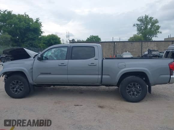 2021 Toyota Tacoma SR5 z VIN 3TMDZ5BN7MM106221, wystawiony jako IAAI lot #42827931 z przebiegiem 71 851 mil mil oraz . Historia ofert i sprzedaży dostępna na DreamBid. Obrazek 14.