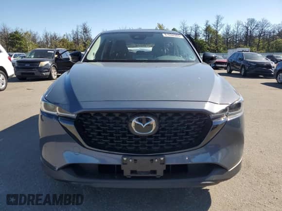 2023 Mazda CX-5 S Carbon Edition z VIN JM3KFBCM5P0219202, wystawiony jako Copart lot #81634365 z przebiegiem 24 429 mil mil oraz Szkoda całkowita • Salvage title. Historia ofert i sprzedaży dostępna na DreamBid. Obrazek 5.