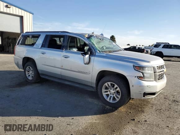 2019 Chevrolet Suburban LT with VIN 1GNSKHKC1KR408201, listed as a Copart auction lot 84291385 with 252,315 mi miles and Clean title. Bid and sale history available at DreamBid. Image 4.