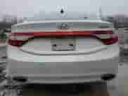 2014 Hyundai Azera Limited z VIN KMHFH4JG2EA378260, wystawiony jako Copart lot #84656144 z przebiegiem 62 292 mil mil oraz Szkoda całkowita • Salvage title. Historia ofert i sprzedaży dostępna na DreamBid. Obrazek 6.