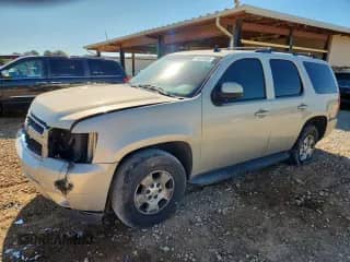 2012 Chevrolet Tahoe LS with VIN 1GNSCAE00CR209583, listed as a Copart auction lot 70043565 with 179,537 mi miles and Salvage title. Bid and sale history available at DreamBid. Image 1.