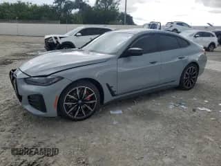 2024 BMW i4 eDrive40 with VIN WBY73AW04RFR48087, listed as a Copart auction lot 67983465 with Not provided miles and Salvage title. Bid and sale history available at DreamBid. Image 1.