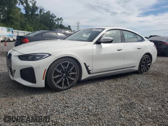 2022 BMW i4 eDrive40 с VIN WBY73AW07NFN08455, выставлен на аукционе Copart как лот 80458345 с пробегом 37 833 миль миль и На запчасти • Non repairable. История ставок и продаж доступна на DreamBid. Изображение 1.