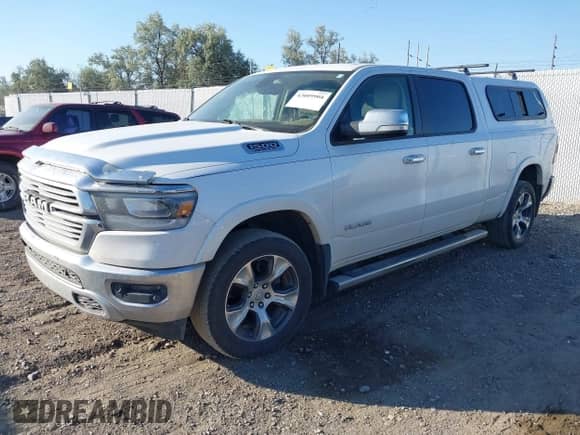 2019 Ram 1500 Laramie with VIN 1C6SRFRT1KN648538, listed as a IAAI auction lot 43009904 with 181,229 mi miles and . Bid and sale history available at DreamBid. Image 2.