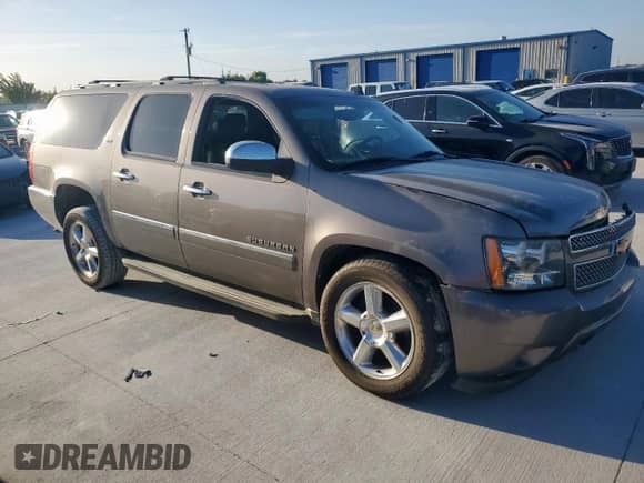 2012 Chevrolet Suburban LTZ с VIN 1GNSCKE08CR109351, выставлен на аукционе Copart как лот 67061875 с пробегом 150 694 миль миль и Списание • Salvage title. История ставок и продаж доступна на DreamBid. Изображение 4.