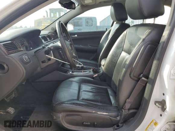 2012 Chevrolet Impala LTZ with VIN 2G1WC5E30C1221083, listed as a Copart auction lot 81643965 with 153,674 mi miles and Salvage title. Bid and sale history available at DreamBid. Image 7.