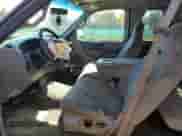 2000 Ford F-150 XL z VIN 1FTRX18L9YKA39810, wystawiony jako Copart lot #85877565 z przebiegiem 191 424 mil mil oraz Szkoda całkowita • Salvage title. Historia ofert i sprzedaży dostępna na DreamBid. Obrazek 7.