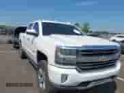 2016 Chevrolet Silverado 1500 High Country z VIN 3GCUKTEC6GG229479, wystawiony jako IAAI lot #42683779 z przebiegiem 128 993 mil mil oraz . Historia ofert i sprzedaży dostępna na DreamBid. Obrazek 1.