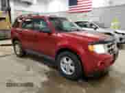 2011 Ford Escape XLT with VIN 1FMCU9D71BKC11644, listed as a Copart auction lot 55958615 with 248,084 mi miles and Salvage title. Bid and sale history available at DreamBid. Image 4.