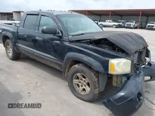 2005 Dodge Dakota SLT with VIN 1D7HW48NX5S140082, listed as a IAAI auction lot 42738619 with 197,603 mi miles and . Bid and sale history available at DreamBid. Image 1.