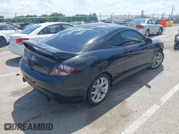 2007 Hyundai Tiburon GT с VIN KMHHN66F17U261929, выставлен на аукционе IAAI как лот 42679006 с пробегом 100 213 миль миль и . История ставок и продаж доступна на DreamBid. Изображение 4.