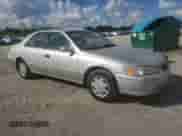 2000 Toyota Camry CE with VIN 4T1BG22K6YU010563, listed as a Copart auction lot 82554515 with 181,583 mi miles and Salvage title. Bid and sale history available at DreamBid. Image 4.