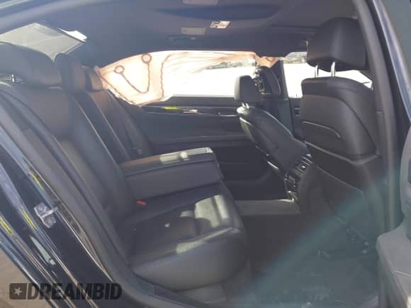2015 BMW 7 Series with VIN WBAYG6C59FD383735, listed as a IAAI auction lot 42106255 with 107,936 mi miles and . Bid and sale history available at DreamBid. Image 8.