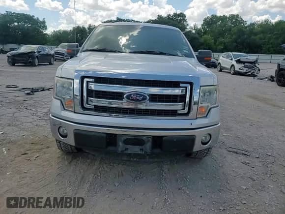 2014 Ford F-150 XLT с VIN 1FTEW1CMXEFB66460, выставлен на аукционе Copart как лот 62214535 с пробегом 211 244 миль миль и Списание • Salvage title. История ставок и продаж доступна на DreamBid. Изображение 13.
