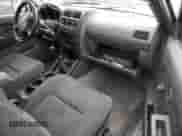 2003 Nissan Frontier XE с VIN 1N6DD26TX3C439032, выставлен на аукционе Copart как лот 86320175 с пробегом 214 552 миль миль и Списание • Salvage title. История ставок и продаж доступна на DreamBid. Изображение 8.