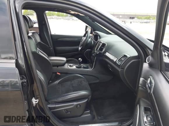 2015 Jeep Grand Cherokee SRT with VIN 1C4RJFDJ8FC768262, listed as a IAAI auction lot 42739805 with 86,840 mi miles and . Bid and sale history available at DreamBid. Image 5.