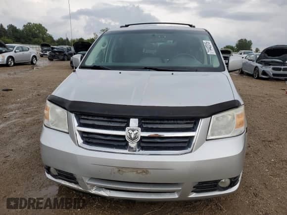 2010 Dodge Grand Caravan SXT с VIN 2D4RN5D18AR261427, выставлен на аукционе Copart как лот 71442315 с пробегом 177 644 миль миль и Списание • Salvage title. История ставок и продаж доступна на DreamBid. Изображение 5.