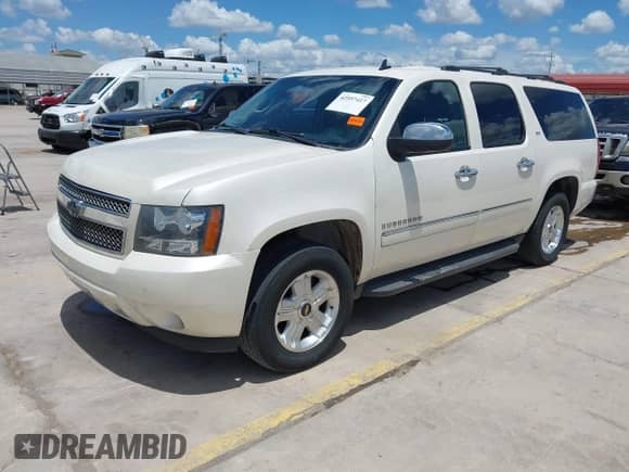 2013 Chevrolet Suburban LTZ with VIN 1GNSCKE08DR101994, listed as a IAAI auction lot 42597417 with 270,849 mi miles and . Bid and sale history available at DreamBid. Image 2.