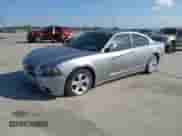 2014 Dodge Charger SE z VIN 2C3CDXBG9EH192983, wystawiony jako IAAI lot #43553133 z przebiegiem 124 512 mil mil oraz . Historia ofert i sprzedaży dostępna na DreamBid. Obrazek 2.