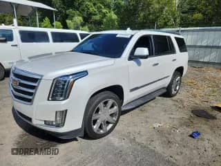 2017 Cadillac Escalade Luxury с VIN 1GYS4BKJ1HR153910, выставлен на аукционе Copart как лот 62933895 с пробегом Не указан миль и Списание • Salvage title. История ставок и продаж доступна на DreamBid. Изображение 1.