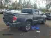 2017 Toyota Tacoma Limited with VIN 3TMGZ5AN1HM047851, listed as a Copart auction lot 82239165 with 127,129 mi miles and Clean title. Bid and sale history available at DreamBid. Image 3.