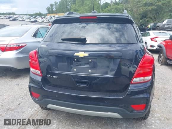 2022 Chevrolet Trax LT with VIN KL7CJPSM1NB534507, listed as a IAAI auction lot 42988585 with 58,401 mi miles and . Bid and sale history available at DreamBid. Image 16.