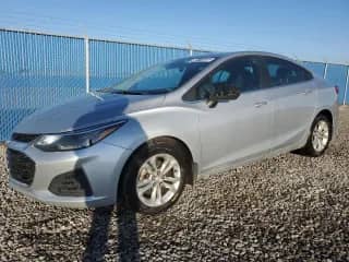 2019 Chevrolet Cruze LT z VIN 1G1BE5SM2K7125141, wystawiony jako Copart lot #86111935 z przebiegiem 182 733 mil mil oraz Czysty tytuł • Clean title. Historia ofert i sprzedaży dostępna na DreamBid. Obrazek 1.