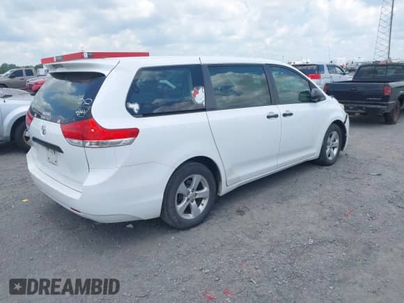 2014 Toyota Sienna L with VIN 5TDZK3DC0ES516239, listed as a IAAI auction lot 42668149 with 178,413 mi miles and . Bid and sale history available at DreamBid. Image 4.