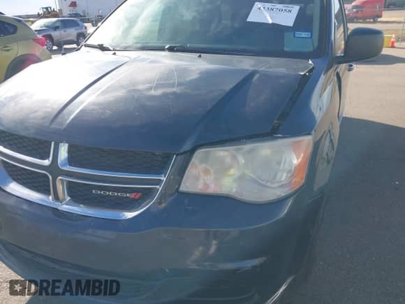 2013 Dodge Grand Caravan SE with VIN 2C4RDGBGXDR791339, listed as a IAAI auction lot 43387058 with 212,746 mi miles and . Bid and sale history available at DreamBid. Image 6.