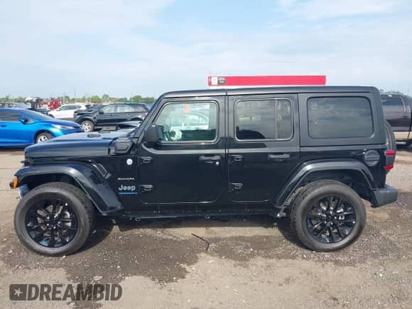 2023 Jeep Wrangler Sahara with VIN 1C4JJXP62PW628735, listed as a IAAI auction lot 42683940 with 46,534 mi miles and . Bid and sale history available at DreamBid. Image 14.