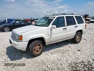 1998 Jeep Grand Cherokee Limited с VIN 1J4GZ78Y4WC112941, выставлен на аукционе Copart как лот 66895995 с пробегом Не указан миль и Списание • Salvage title. История ставок и продаж доступна на DreamBid. Изображение 1.