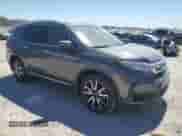 2019 Honda Pilot Touring 8-Passenger with VIN 5FNYF6H99KB033154, listed as a Copart auction lot 70672085 with 104,300 mi miles and Salvage title. Bid and sale history available at DreamBid. Image 4.