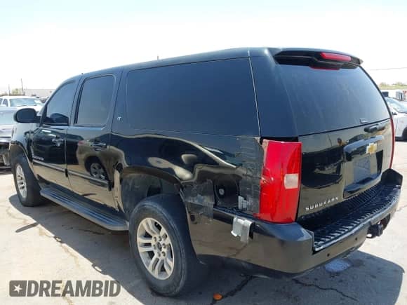 2013 Chevrolet Suburban LT with VIN 1GNSCJE02DR176393, listed as a IAAI auction lot 42483598 with 266,075 mi miles and . Bid and sale history available at DreamBid. Image 14.