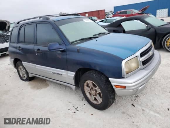 2002 Chevrolet Tracker LT с VIN 2CNBE634126928532, выставлен на аукционе Copart как лот 76990704 с пробегом Не указан миль и Списание • Salvage title. История ставок и продаж доступна на DreamBid. Изображение 4.