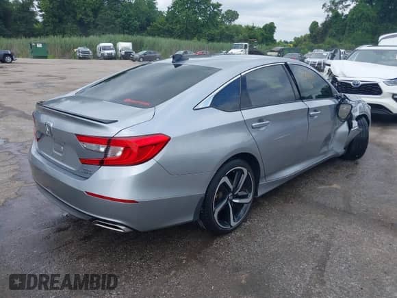 2021 Honda Accord Sport with VIN 1HGCV2F35MA004560, listed as a IAAI auction lot 42746583 with 63,997 mi miles and . Bid and sale history available at DreamBid. Image 4.