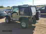 2004 Jeep Wrangler Sport z VIN 1J4FA49S24P710365, wystawiony jako Copart lot #68557195 z przebiegiem 242 901 mil mil oraz Szkoda całkowita • Salvage title. Historia ofert i sprzedaży dostępna na DreamBid. Obrazek 2.