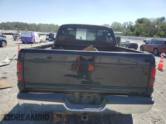2002 Dodge 2500 with VIN 3B7KC23Z32M230122, listed as a Copart auction lot 70956195 with 195,384 mi miles and Salvage title. Bid and sale history available at DreamBid. Image 6.
