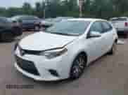 2016 Toyota Corolla L with VIN 2T1BURHE4GC557995, listed as a IAAI auction lot 42883766 with 208,519 mi miles and . Bid and sale history available at DreamBid. Image 18.