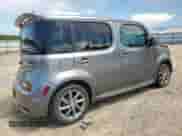 2011 Nissan Cube S Krom Edition с VIN JN8AZ2KR8BT203421, выставлен на аукционе Copart как лот 65243695 с пробегом 103 704 миль миль и Списание • Salvage title. История ставок и продаж доступна на DreamBid. Изображение 3.