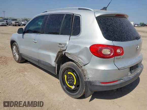 2011 Volkswagen Tiguan S with VIN WVGBV7AX9BW524886, listed as a IAAI auction lot 41828847 with 199,813 mi miles and . Bid and sale history available at DreamBid. Image 3.