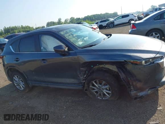 2025 Mazda CX-5 S Preferred z VIN JM3KFBCL6S0643407, wystawiony jako IAAI lot #42836380 z przebiegiem 13 930 mil mil oraz . Historia ofert i sprzedaży dostępna na DreamBid. Obrazek 13.