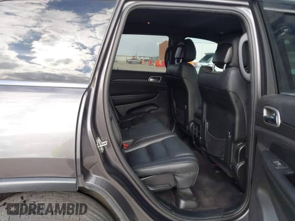 2018 Jeep Grand Cherokee Laredo z VIN 1C4RJEAG7JC450922, wystawiony jako IAAI lot #41169294 z przebiegiem 158 689 mil mil oraz . Historia ofert i sprzedaży dostępna na DreamBid. Obrazek 8.