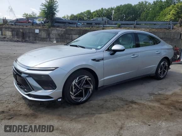 2025 Hyundai Sonata SEL Convenience с VIN KMHL14JA0SA467114, выставлен на аукционе Copart как лот 65951405 с пробегом 445 миль миль и Списание • Salvage title. История ставок и продаж доступна на DreamBid. Изображение 1.