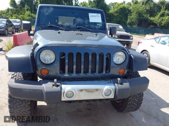 2008 Jeep Wrangler Unlimited Sahara with VIN 1J4GA59128L607591, listed as a IAAI auction lot 42959722 with 129,564 mi miles and . Bid and sale history available at DreamBid. Image 12.