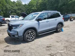 2022 Honda Passport Elite with VIN 5FNYF8H0XNB027168, listed as a Copart auction lot 66992495 with 46,446 mi miles and Salvage title. Bid and sale history available at DreamBid. Image 1.
