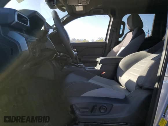 2024 Toyota Tacoma TRD Off Road with VIN 3TMLB5JN8RM000837, listed as a Copart auction lot 82183745 with 14,184 mi miles and Salvage title. Bid and sale history available at DreamBid. Image 7.